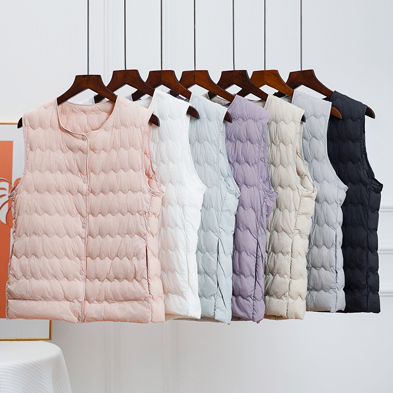 Light and thin demi-season short keep warm vest with down with a…