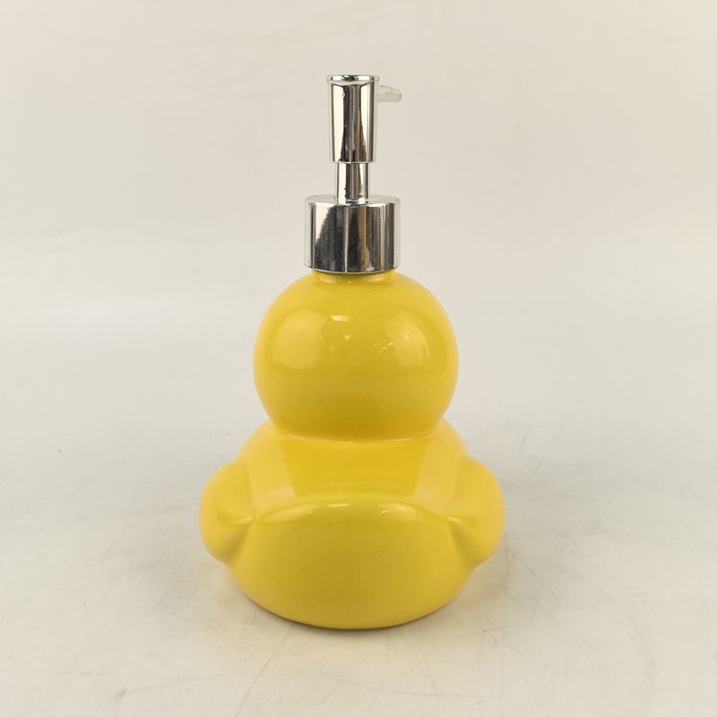 Cerámica pequeña taza de boca de pato amarillo botella de loción botella de jabón prensa dibujos animados lindo pato amarillo grande champú baño de agua