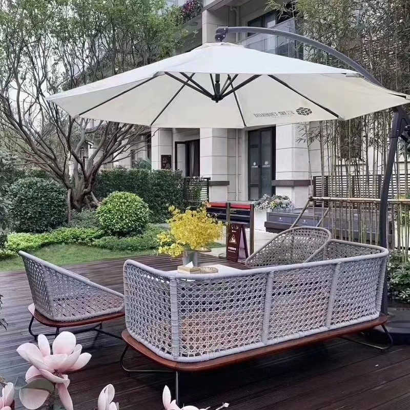 Ocio al aire libre balcón de caña mesa de té combinación de tres piezas de alojamiento residencial patio hotel villa sofá estilo nórdico