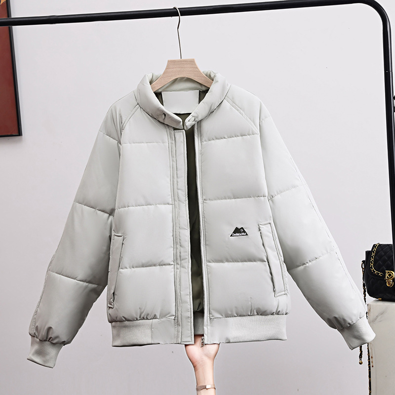 Nuevo estilo de invierno coreano suelto de cuello de pie ropa de pan pareja engrosada de algodón chaqueta de algodón chaqueta de moda para hombres y mujeres