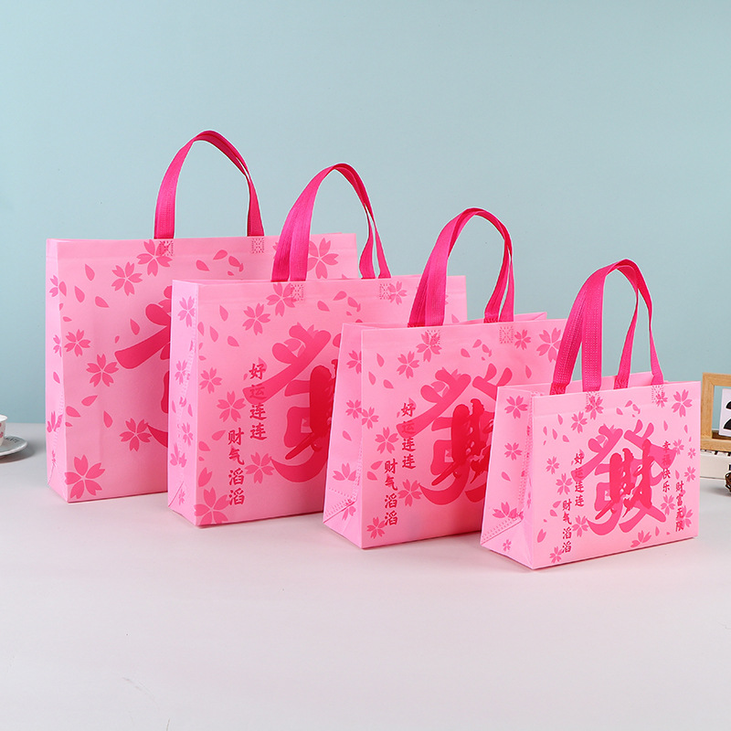 Bolsas de mano no tejidas al por mayor bolsas de embalaje estereoscópicas resistentes al desgaste bolsas de embalaje de dormitorios de estudiantes bolsas de mano en stock
