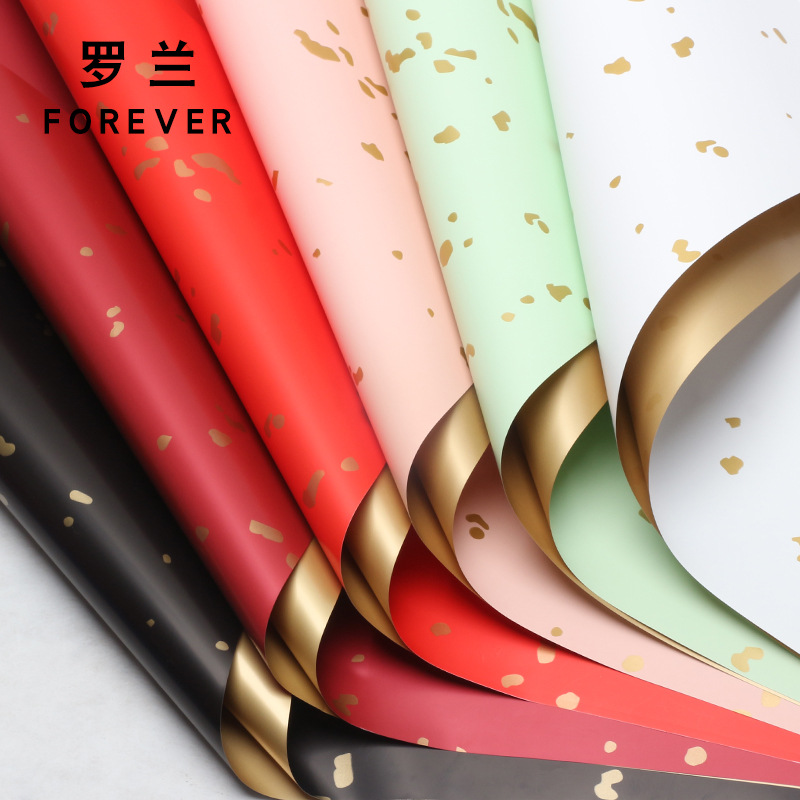 Roland Espolvorear papel dorado papel de embalaje de flores material impermeable y engrosado floristería de dos colores papel de embalaje de ramo de flores