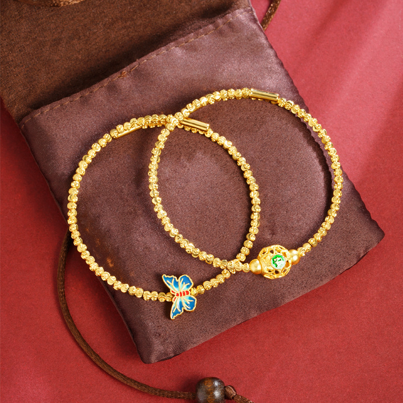 La antigua pulsera de mariposa de aceite de gota azul quemada con cuentas láser de oro francés antiguo de Vietnam no se desvanece durante mucho tiempo, fábrica de lujo ligero retro al por mayor