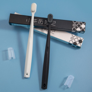 Calf adventures toothbrush ten thousand hair confinement toothbrush black and white two-color toothbrush soft hair advanced toothbrush