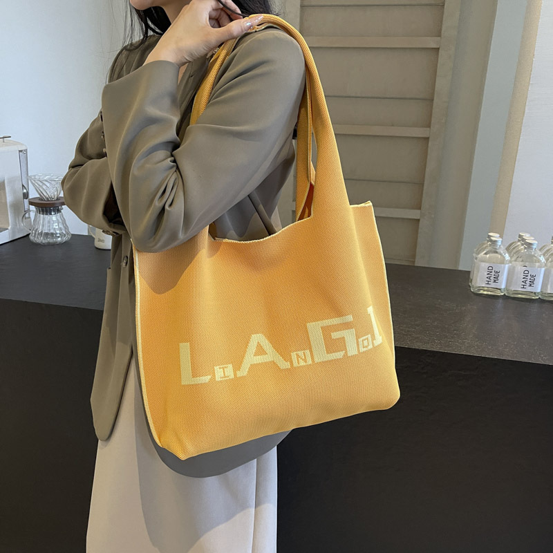 Knitted bag, simple and large-capacity single-shoulder bag, fashionable striped bucket bag for students going out, new tote bag for commuting to work Specification drawing