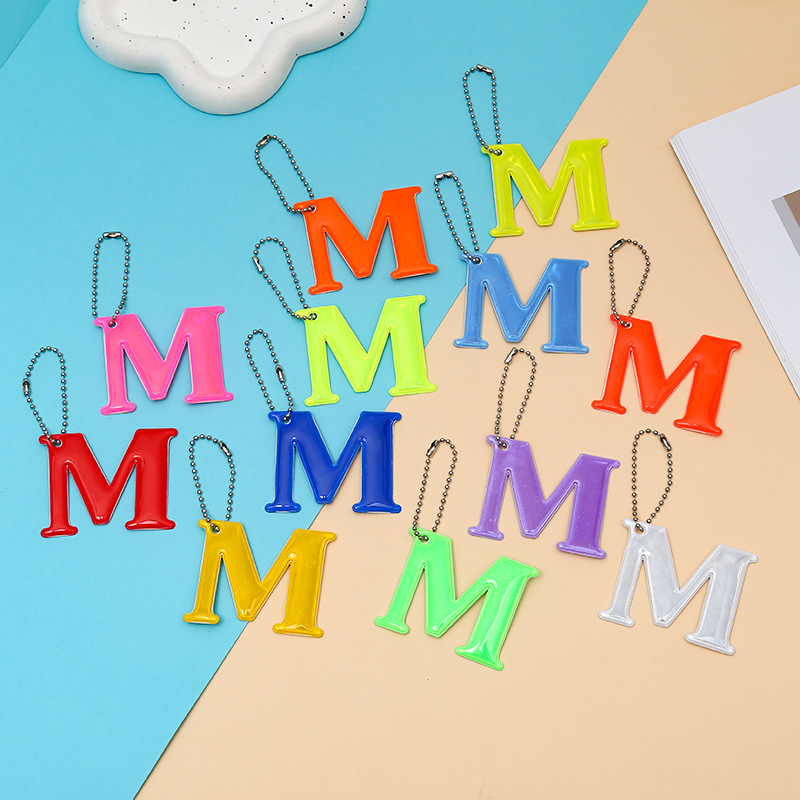 跨境字母M12色反光警示挂件PVC骑行背包挂件夜间标识钥匙扣挂件