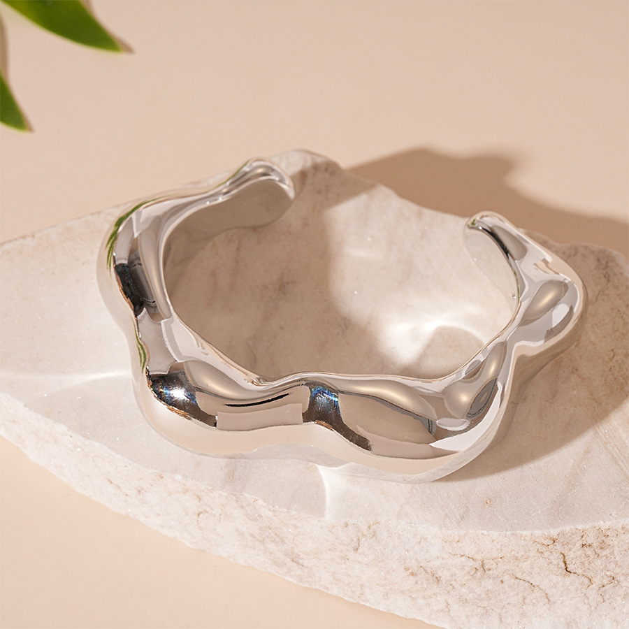 Pulsera de apertura geométrica irregular metálica europea y americana, personalidad exagerada, temperamento de nicho simple, joyería de alta gama femenina