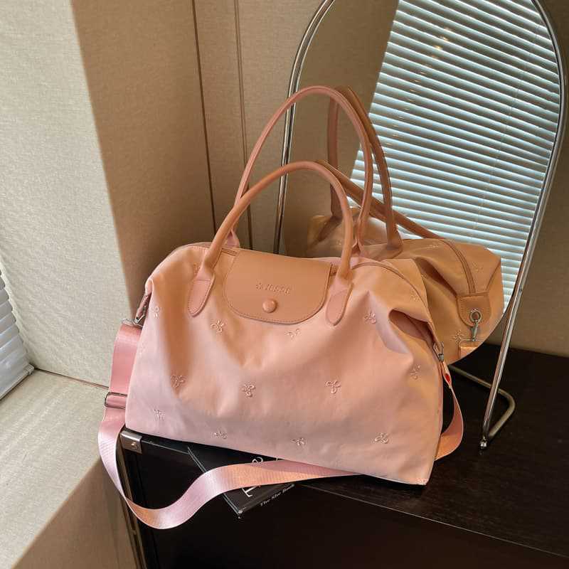 简约蝴蝶结手提旅行包大容量行李包女短途出行健身斜挎休闲收纳包