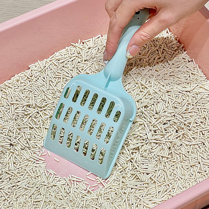Fábrica de pala de arena para gatos venta directa de plástico para gatos limpio y simple para decollar el inodoro de malla hueca para gatos al por mayor