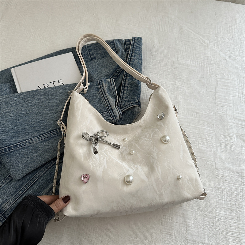 Mochila de diseño de nicho, mochila de hombro, mochila multipropósito, bolsas de cadena de alta capacidad.