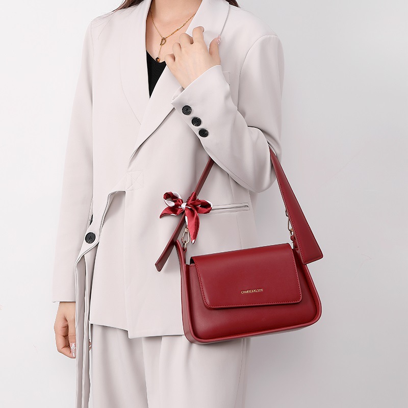 Hong Kong compra bolsos rojos, bolsos de brazo de mujer, bolsos de boda de lujo ligero, bolsos de mano de regazo diarios
