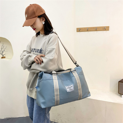 New short-distance business trip travel bag, women's large-capacity shoulder hand-held luggage bag for maternity, can be placed in a trolley suitcase luggage bag