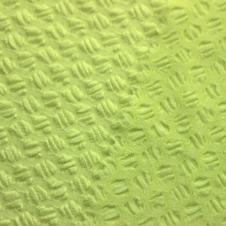 提花咖啡豆单面布汗布服装面料针织纬编全涤氨纶起皱泡泡单面布料