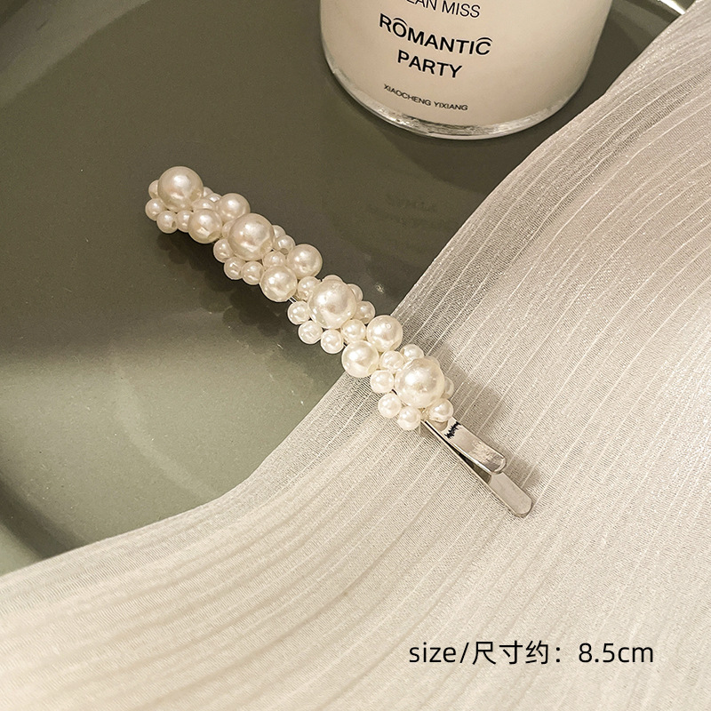 Corea del Sur clip para el cabello de perlas en línea clip para el cabello de mujeres rasgadas clip para el cabello de una palabra clip para el cabello de bordes fría BB clip lateral clip para el temperamento clip para la cabeza