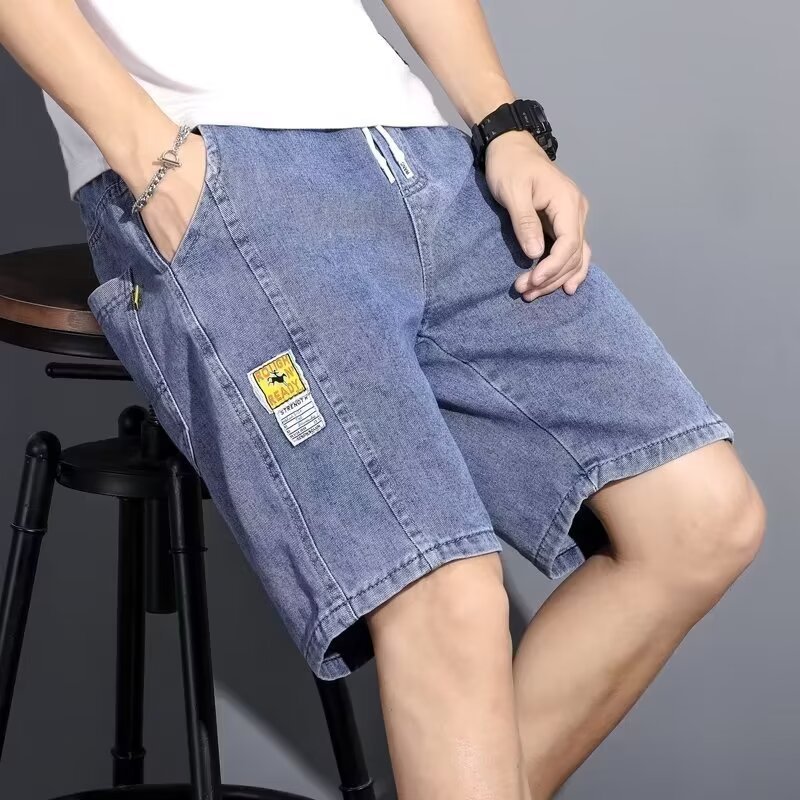 Pantalones cortos de mezclilla de cinco puntos de estilo fino de verano para hombres, pantalones de marca de moda casuales delgados, pantalones de 5 puntos para hombres