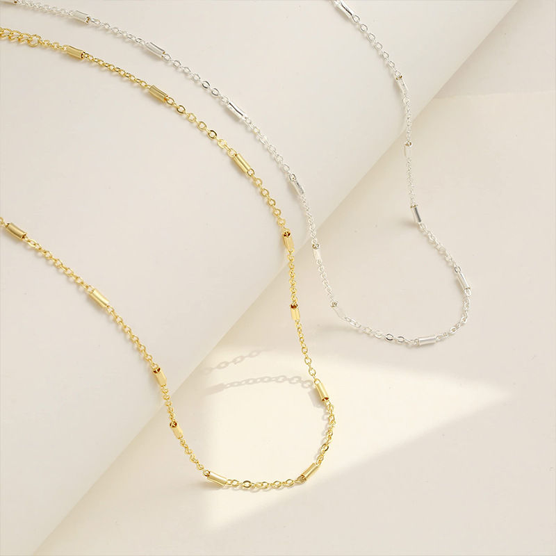 Colar dourado de camada única, corrente lisa, joia de alta qualidade, design de nicho com barra redonda pequena._voghion.com
