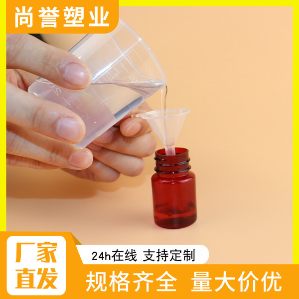 Plastic measuring cup scaled