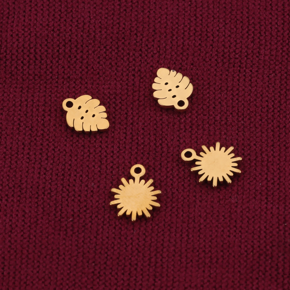 Acero inoxidable transfronteriza hoja pequeña etiqueta colgante DIY accesorios de la joyería hecha a mano sol pequeño colgante pequeña etiqueta