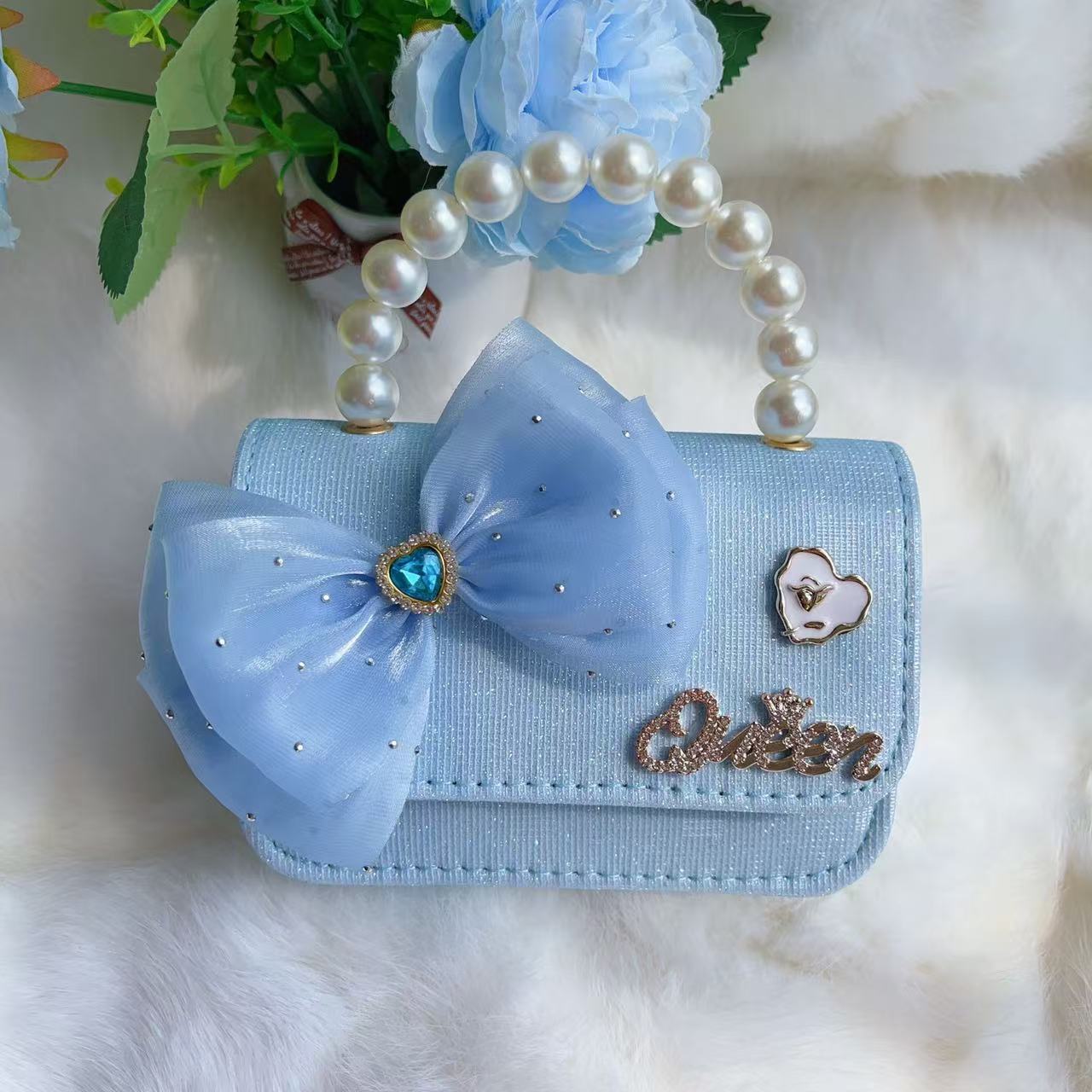 Bagos de perlas para niños 2025 nuevos bolsos de niños bolsos de mochila de niñas bolsos accesorios de princesa bolsos de viento de fragancia