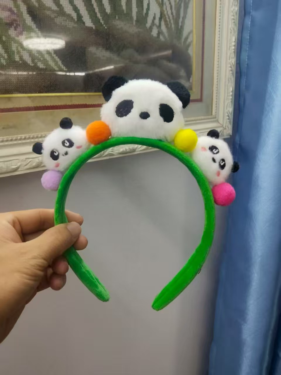 男女通用の大きいパンダのカチューシャは卸売りします。