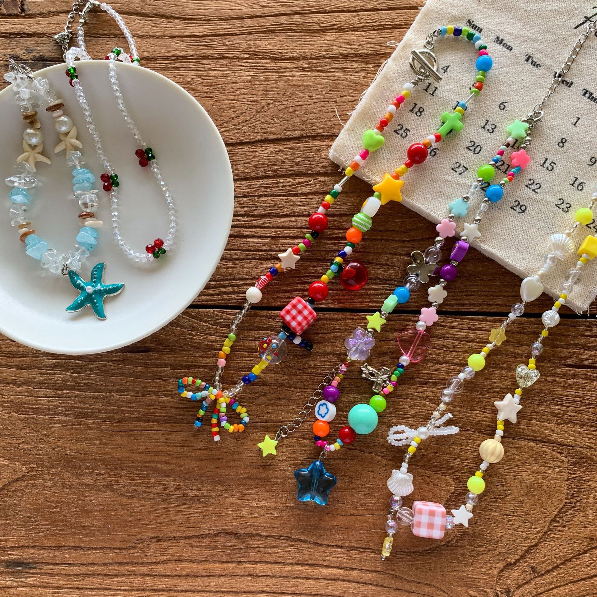 Sugar Pear ropa infantil decoración de niñas collar de arco de cuentas de dopamina colorido 2026 accesorios dulces para mujeres