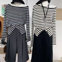 2025春秋新款韩系套头小众条纹撞色排扣开叉不规则针织衫上衣女