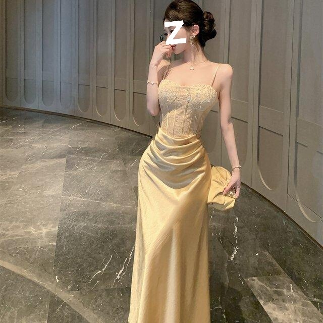 Elegant Goddess-Style Evening Gown in Champagne Gold with Sequins, Lace, and Beaded Patchwork Design, Featuring a Waist-Cinching Strapless Long Dress