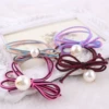 Colored knotted model with pearls in a random color