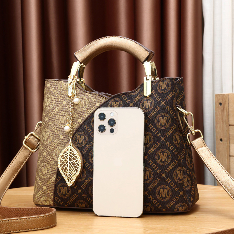 Bolsos de mujer 2025 nuevo bolso de moda de gran capacidad Tote bolso de mujer bolso de mensajero de hombro salvaje mujer transfronteriza