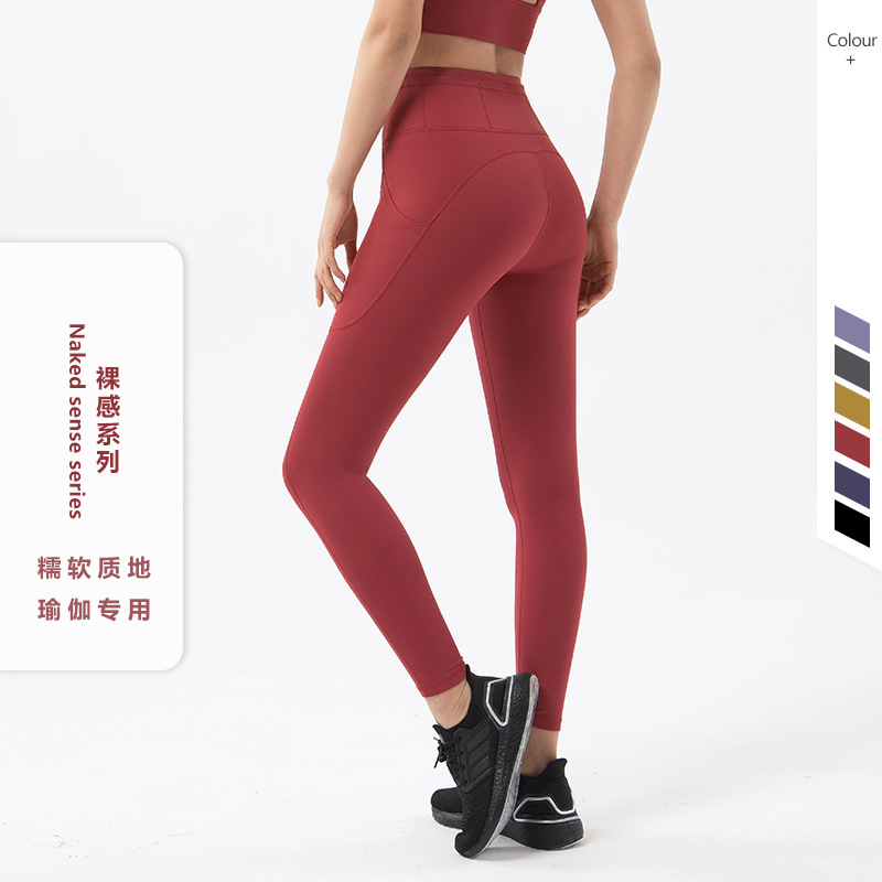 2022 bolsillo lateral desnudo apretado yoga pantalones de las mujeres de Europa y América cintura alta cadera elevación melocotón cadera deportes fitness Pantalones