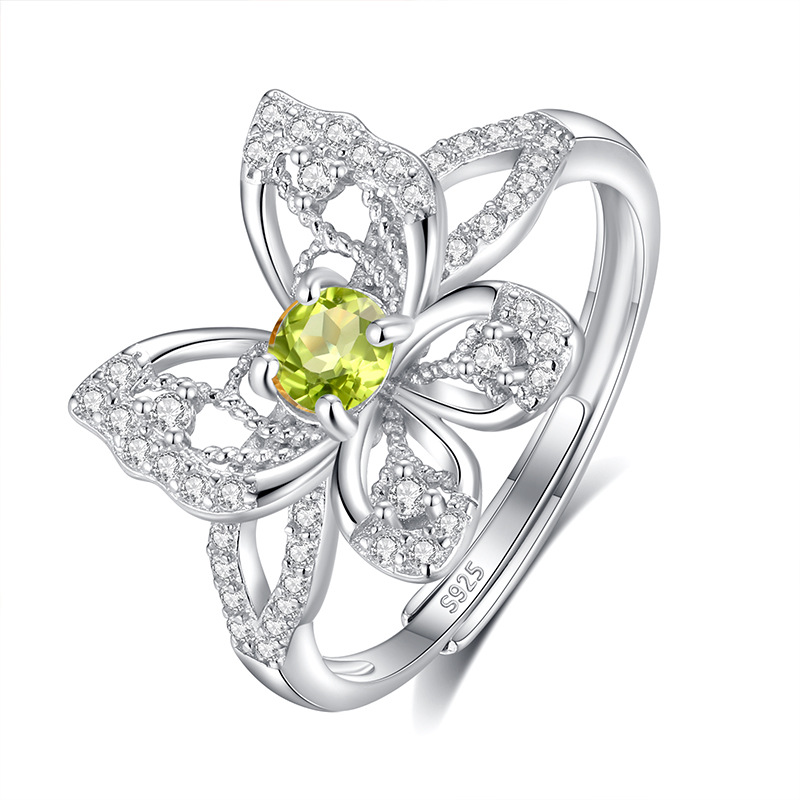 Transmisión en vivo de alta calidad tesoro de color estilo caliente s925 con incrustaciones de plata de ley anillo de mariposa de cristal natural moda femenina todo fósforo temperamento joyería