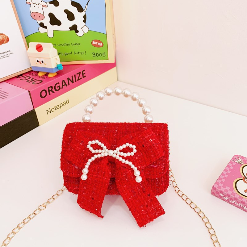 Nuevo arco flotante bolso de niños, bolso de mano de princesa red, bolso de cambio de perlas de moda fragante