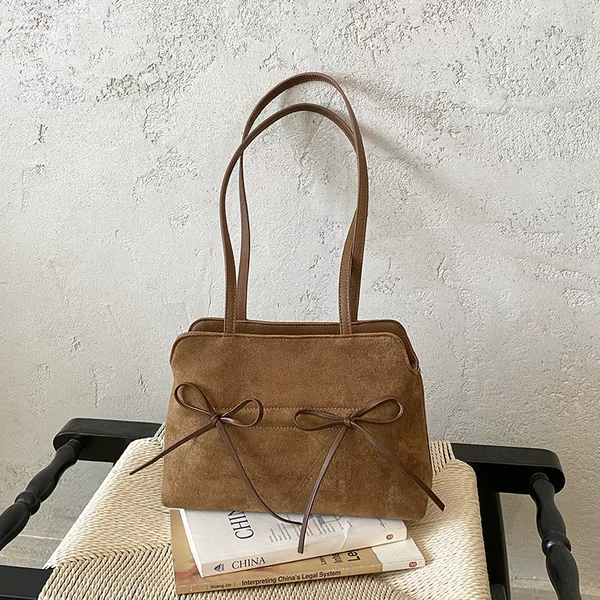 Unique retro bowknot underarm bag for women, new autumn model, simple and elegant, large-capacity commuter shoulder tote bag
