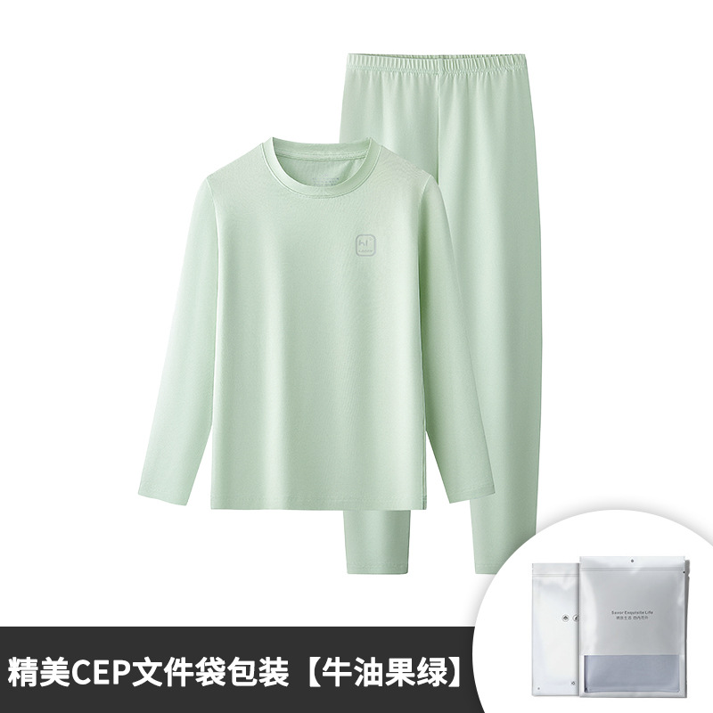 Conjunto de pantalones y tops térmicos finos de manga larga para niños y niñas de otoño e invierno de algodón modal, adecuado para salir o como pijama, color sólido, en stock.