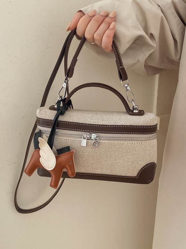 Caja de mano retro europea y americana bolsos pequeños cuadrados para mujeres nuevas ventas calientes de lona transfronteriza color de empalme de hombro único