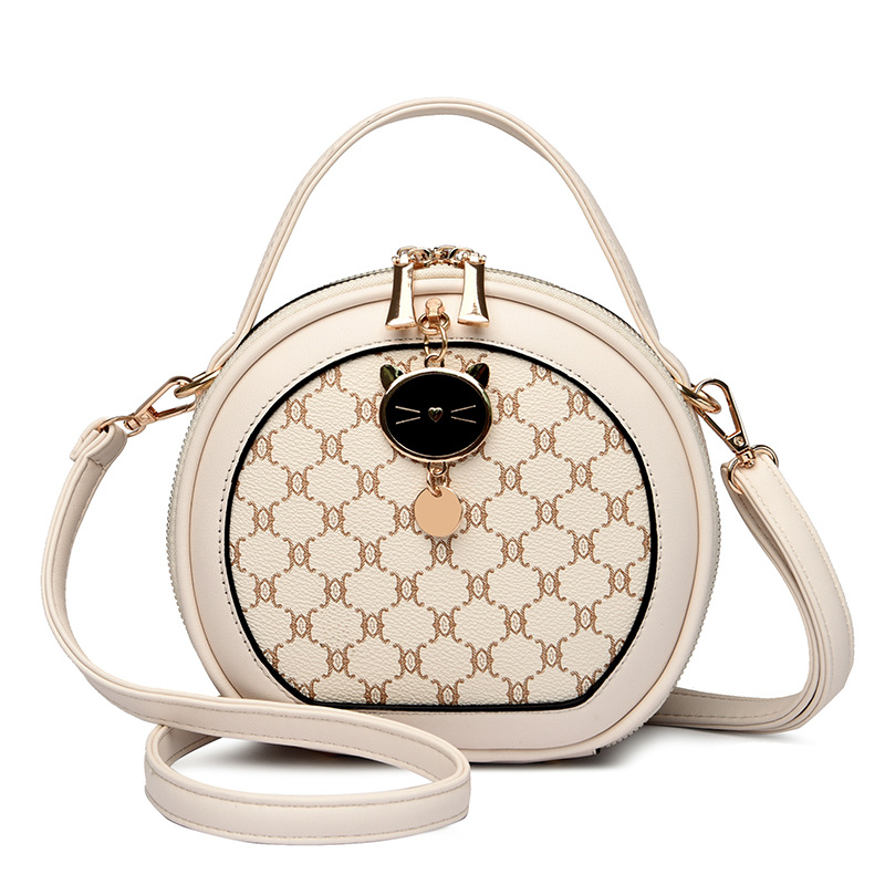 La nueva bolsa redonda impresa a mano de primavera 2023 tiene una piel suave de 98.501 hombros.