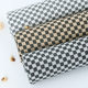 Four seasons popular black and white plaid double-sided knitted fabric 320g checkerboard drape women's casual skirt knitted surface