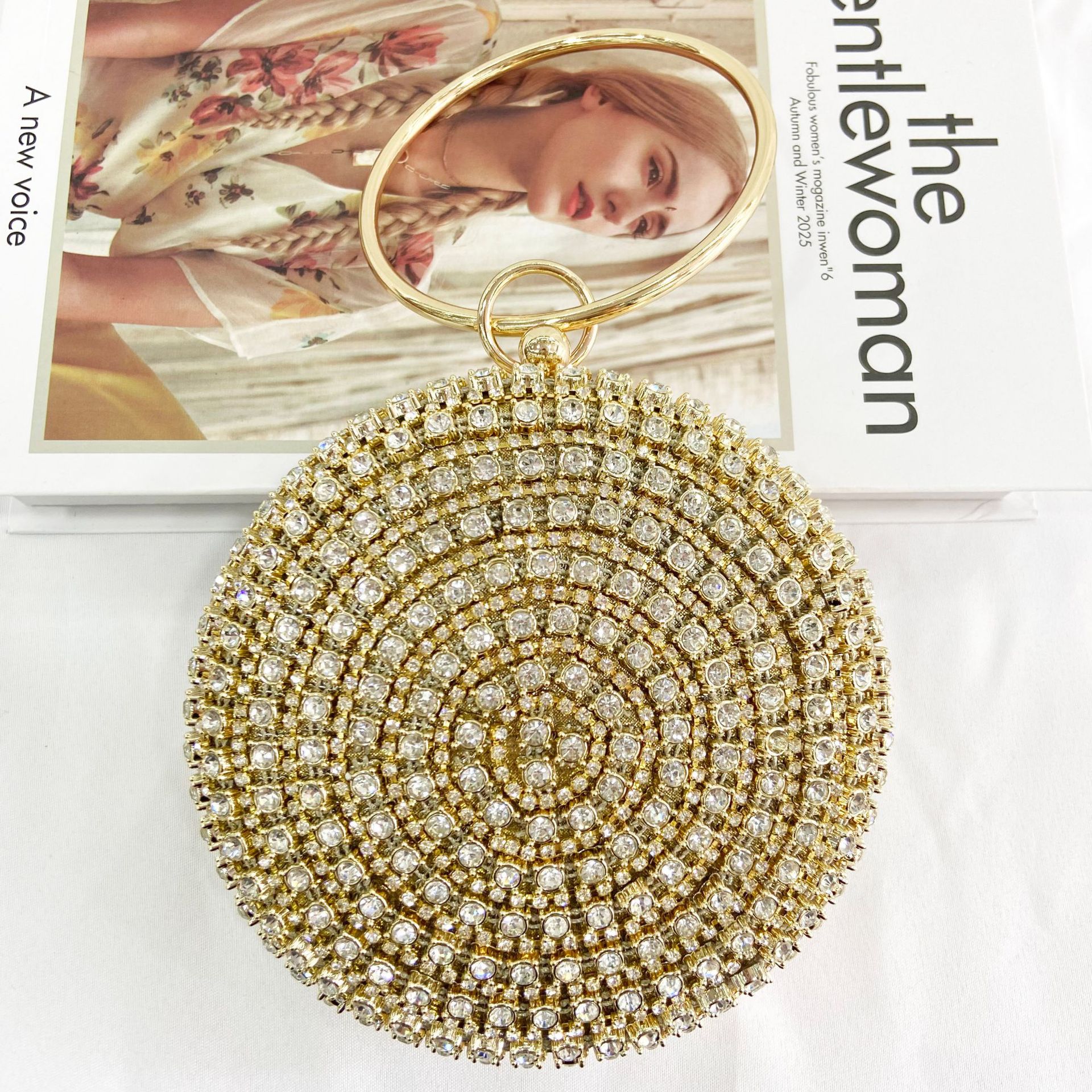 Pochette da sera vintage con bracciale e strass per donna_voghion.com