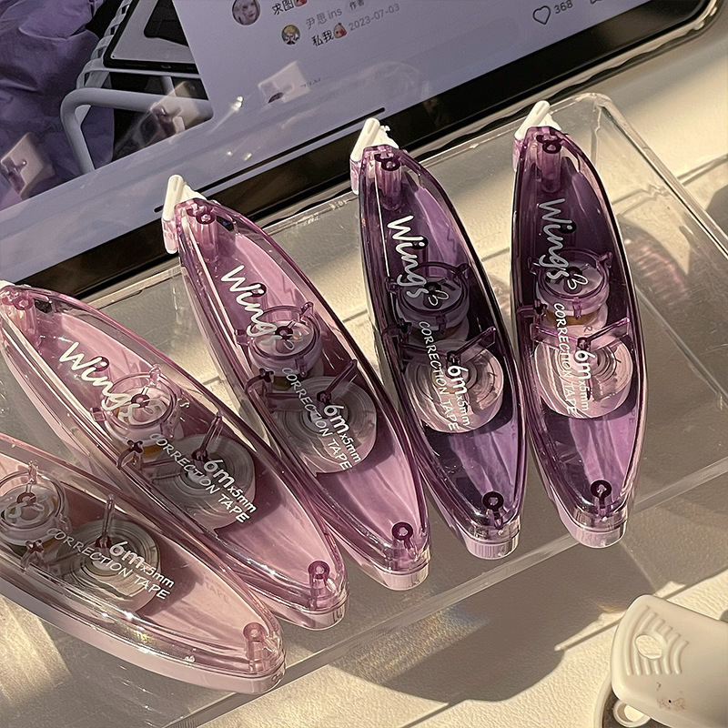 Cinta de corrección en forma de bolígrafo muda mini cinta de corrección ins gradiente Flip cinta de corrección traje de gran capacidad suave Modificación de palabras