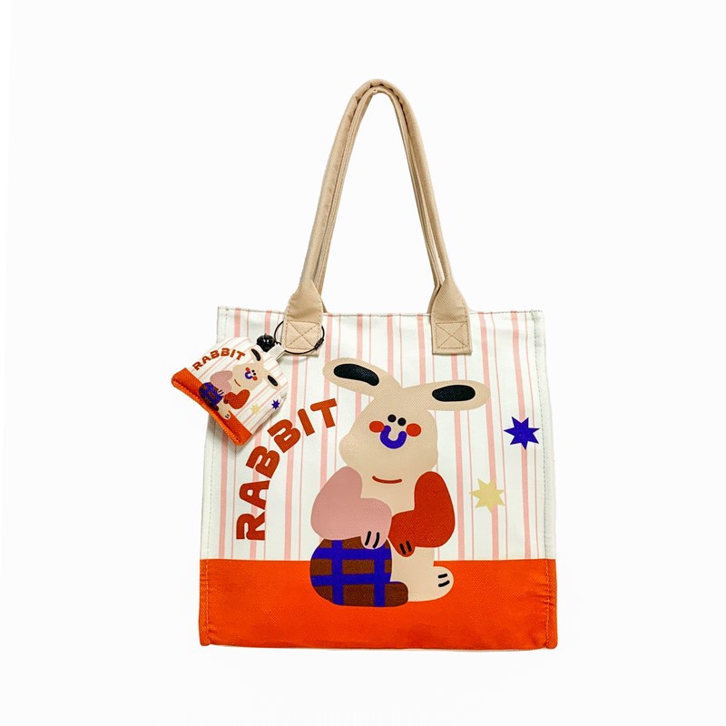 Caricatura de niños y niñas, bolsos de hombro de gran capacidad, bolsos de nicho de diseño, bolsos de mano nuevos lindos para niñas