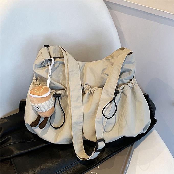 Bolsa de lona de gran capacidad para mujeres 2024 nuevo bolso de hombro casual simple de verano con un sentido de alta calidad de la bolsa de viaje