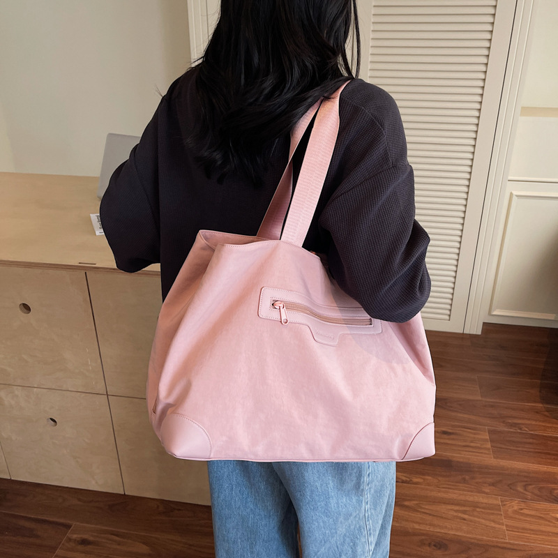 Nuevo tipo de tela casuales de mujer de hombro bolsa de viaje corto de gran capacidad de color sólido bolsa de equipaje ligero de mujer