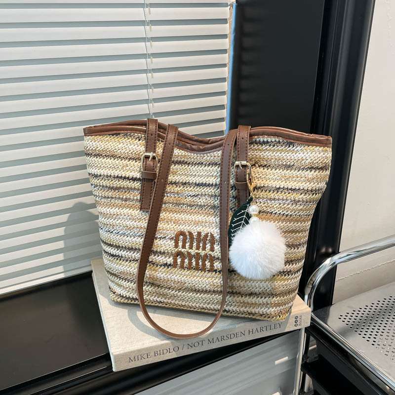 2026 nuevo arco iris trenzado bolso de hombro de gran capacidad de mujer bolso de paja de viaje universal mano de moda rayas