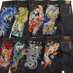 日本式の潮のブランドは魂のkarakuriの浮世絵の同じ種類のプリントの男性のジーパンのゆったりしているストレートな広腿のズボンを結びます。