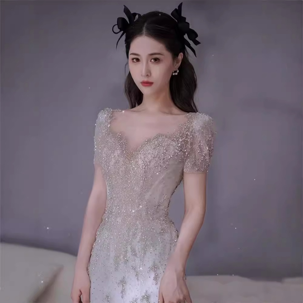Nuevo vestido de novia estilo sirena francés 2026 con cola para bodas transfronterizas, con una elegancia súper mágica para la novia.