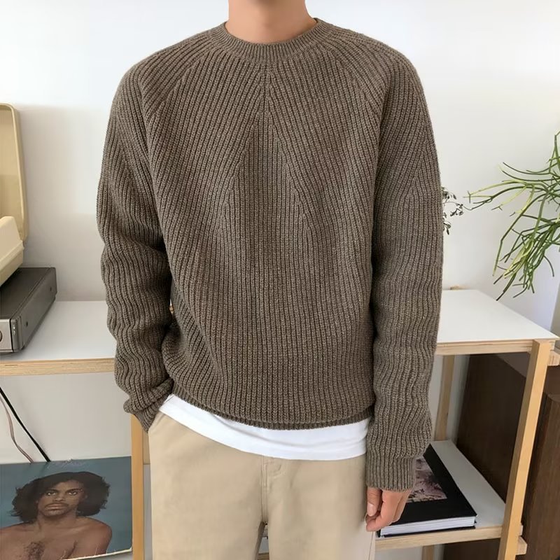 秋冬の軽熟風の新しい丸首のセーターの男性の純色のニットのファッションのゆったりしている底のコートを作ります。