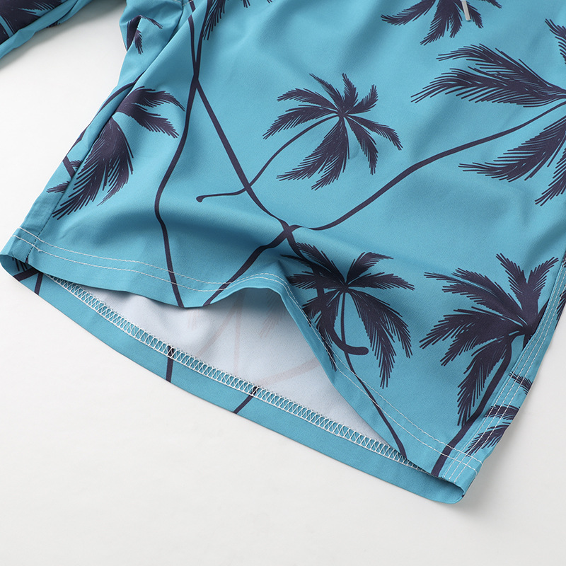 Spot wholesale pareja pantalones de playa hombres sueltos de talla grande casual pantalones cortos de mujer de vacaciones deportes pantalones cortos deportivos elásticos de cuatro caras