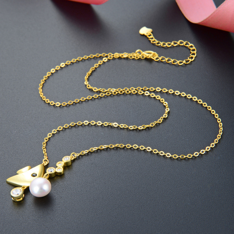 Japón y Corea del Sur personalidad creativa colgante de zircon S925 plata esterlina chapado en oro pequeño pez collar de perlas