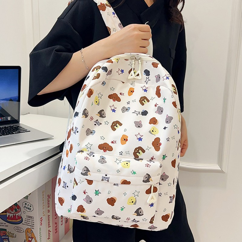 La nueva mochila con estampado de dibujos animados simple reduce la carga de los estudiantes de primaria y secundaria, pequeña mochila escolar fresca, mochila de viaje de ocio