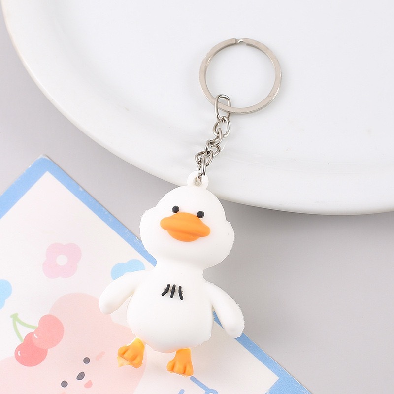 Creativo de dibujos animados pegamento suave pato amarillo colgante llavero adorable reabastecimiento de pato colgante bolsos accesorios llavero al por mayor